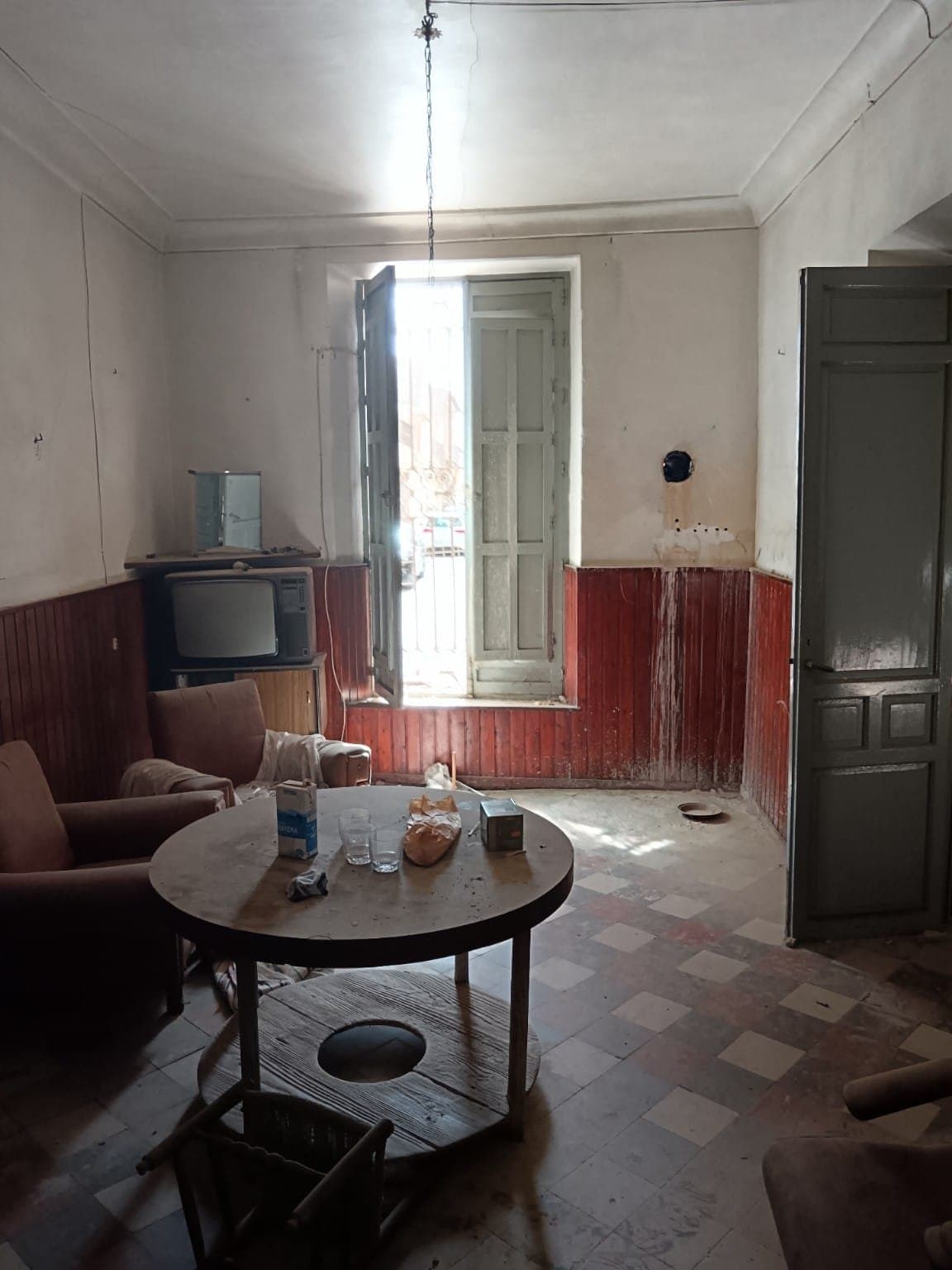 Salón de una vivienda en su estado actual